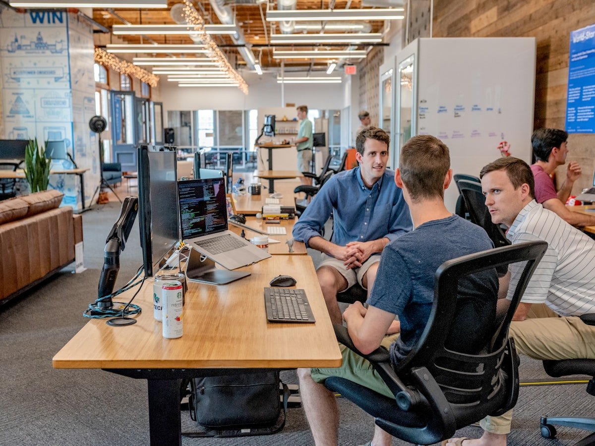 Two professionals reviewing documents together at a desk, representing the Vertisure team coordinating with your closing team
